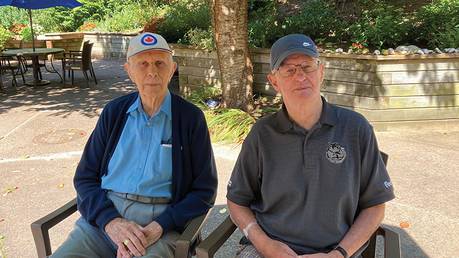 Donald Bishop (left) and Allen Hopkins (right) sit in the gardens at the Camp Hill Veterans Memorial Building at the QEII Health Sciences Centre. Caleb Freeman